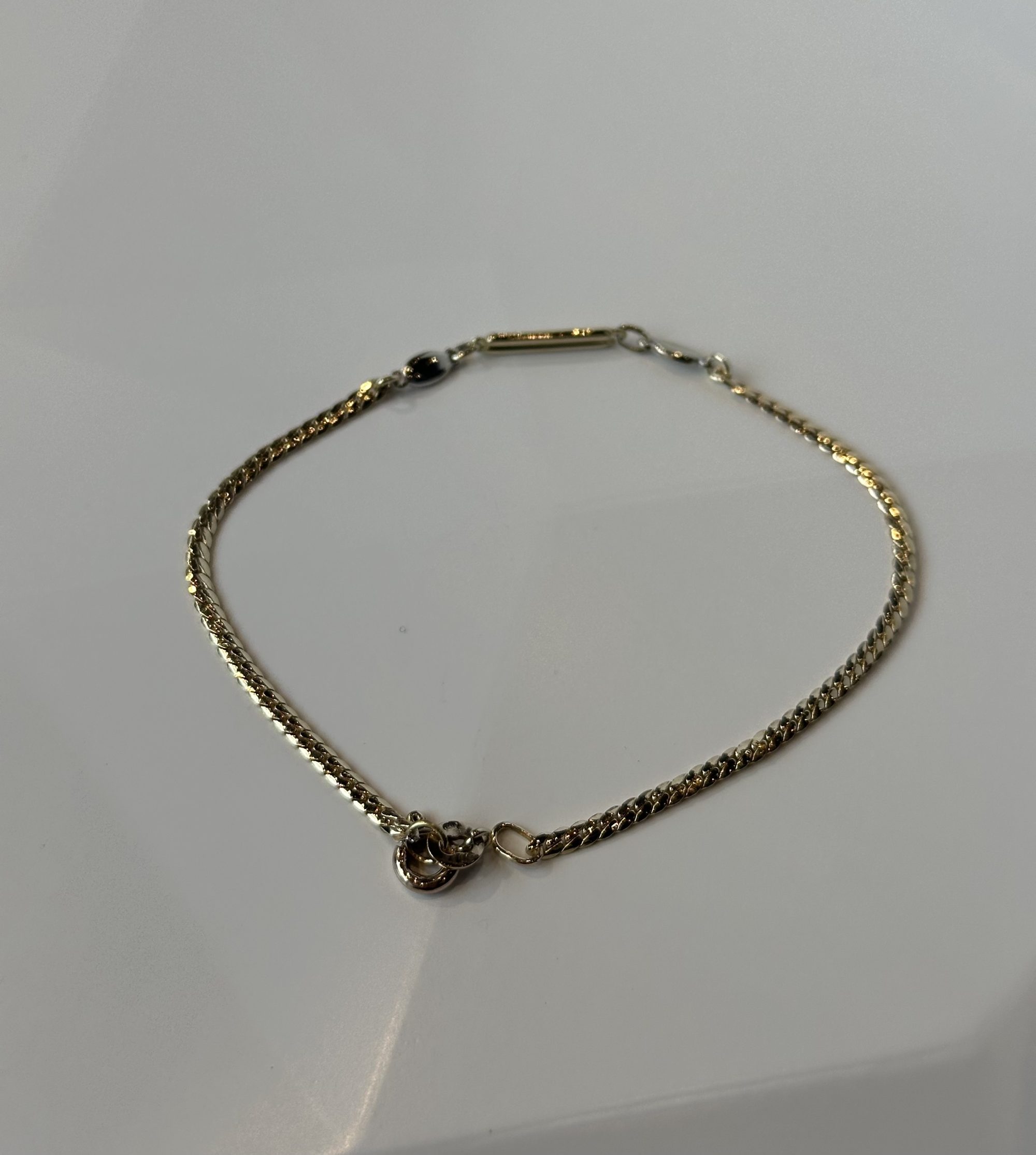 Gouden armband met plaatje bicolor
