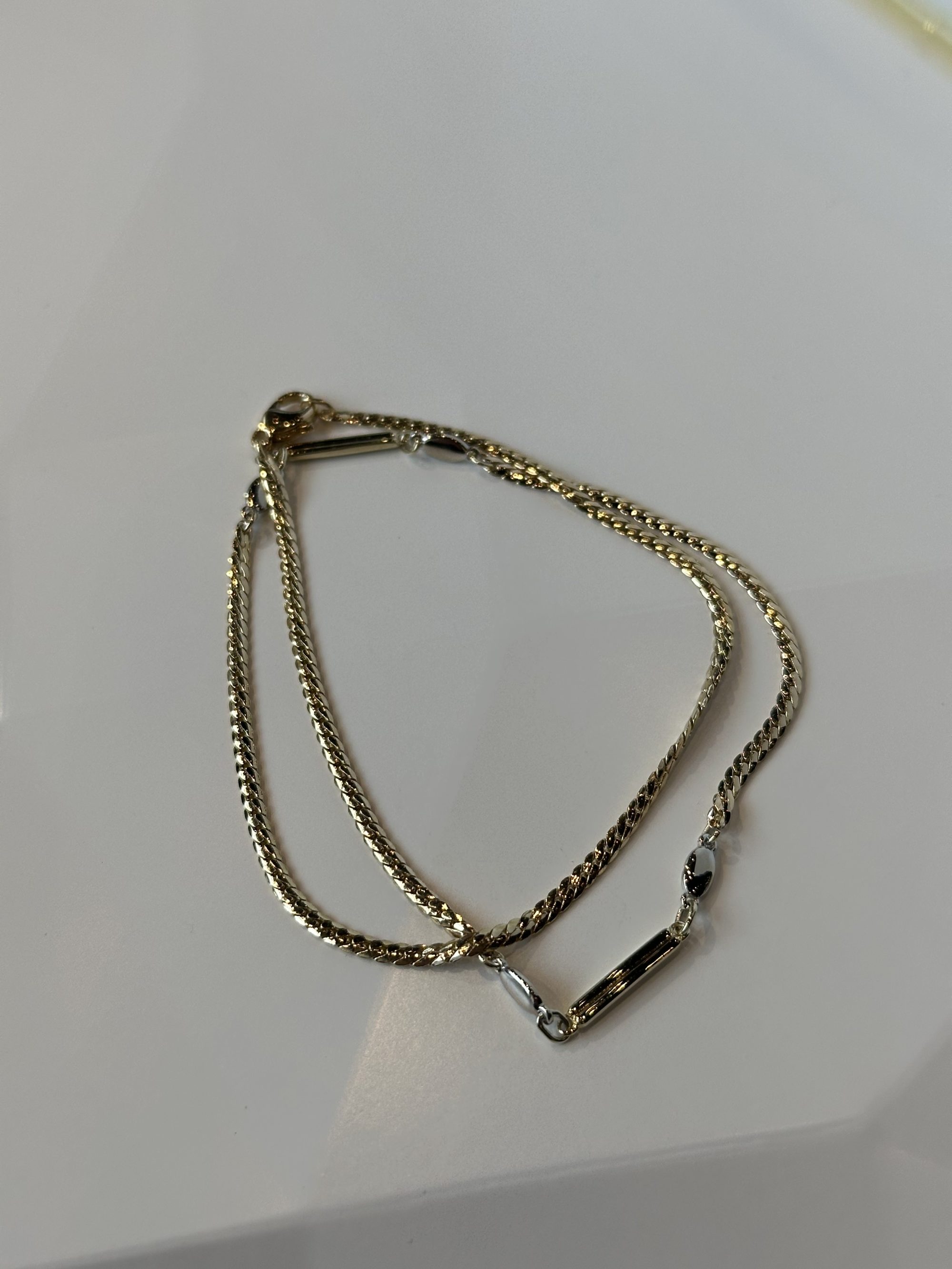 Gouden dubbele armband met plaatje bicolor