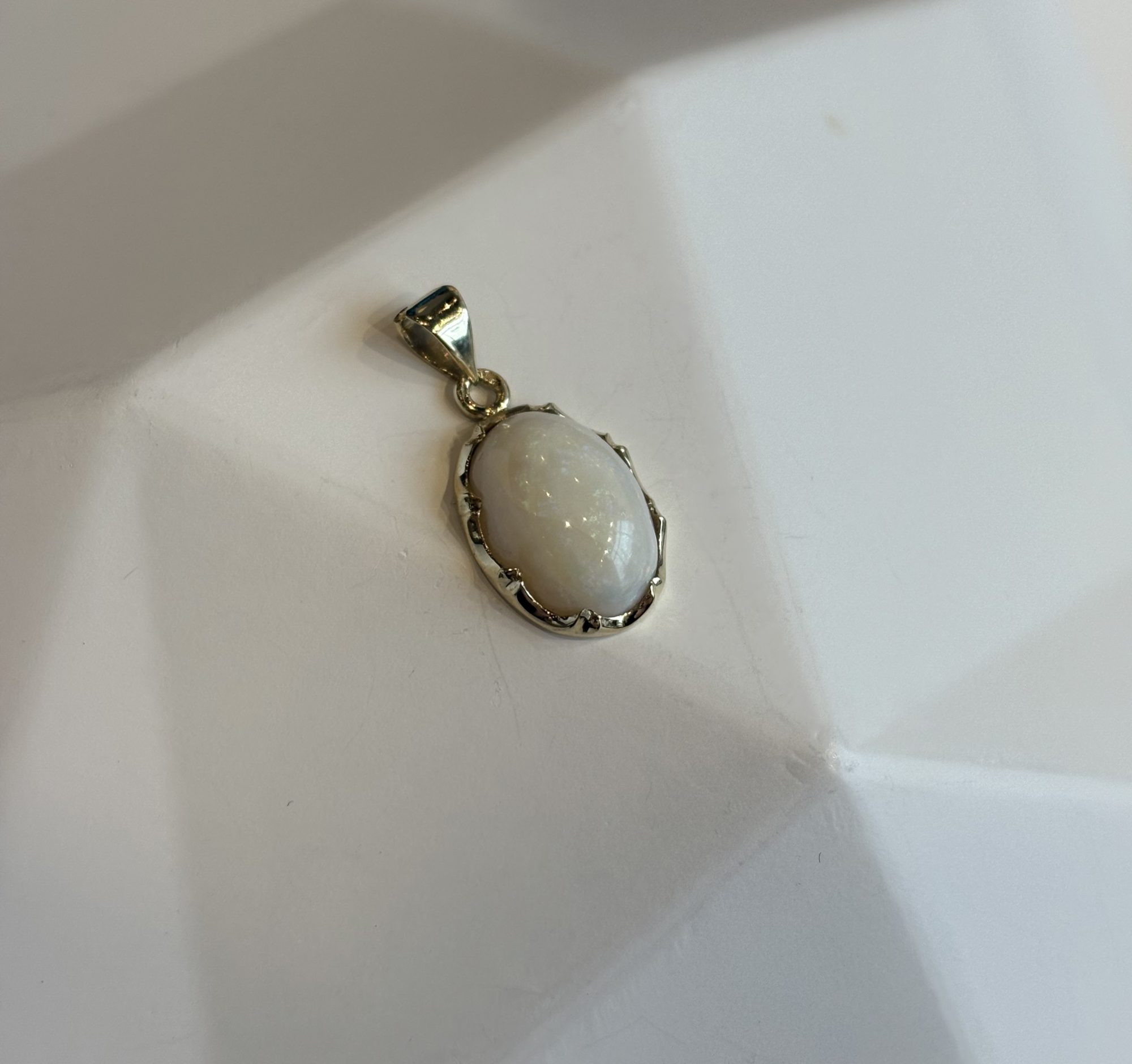 Gouden melkopaal hanger